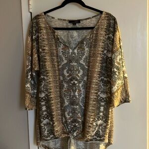 Light sweater, blouse that is really flattering